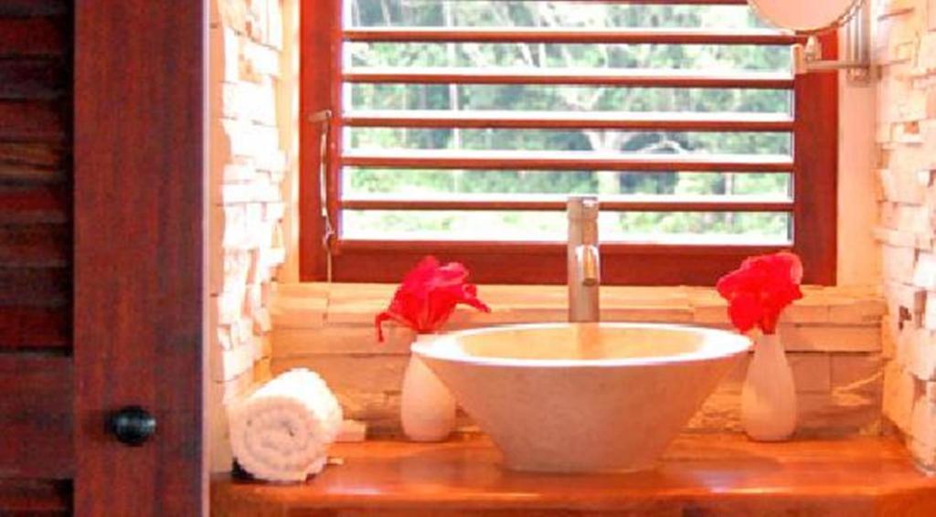 Calibishie Cove Hotell Rom bilde